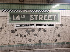 14th Street/Sixth Avenue station in 2023 under renovation, with old tiles removed