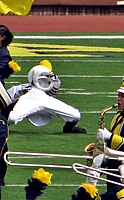 The University of Michigan drum major performs a backbend in 2015.