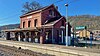 Gare de Godinne (façades et toitures) (M) et ensemble formé par cet édifice et les terrains environnants (S)