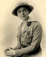 Black and white portrait photograph Lydia Henry in the uniform of the Scottish Women's Hospitals wearing the Croix de Guerre