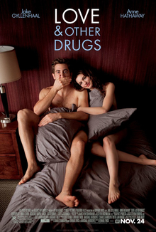 Jamie (Jake Gyllenhaal) and Maggie (Anne Hathaway) are in torn blankets in bed, as information is below and "Love & Other Drugs" is at the top.