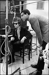 Tom Wilson (right) with Bob Dylan (left), recording "Like a Rolling Stone", 1965