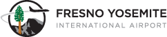 Logo of a plane flying past a sequoia tree and Yosemite’s Half Dome in a circle, next to the words Fresno Yosemite International Airport
