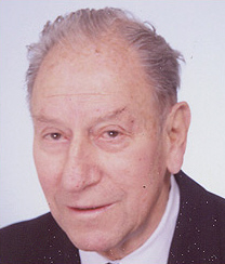 Profile photo of an elderly Heinz Henschel in a black suit coat and white dress shirt