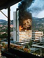 Image 96Executive council building burns in Sarajevo after being hit by Bosnian Serb artillery in the Bosnian War. (from 1990s)