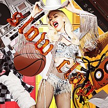The artwork for Gwen Stefani's single "Slow Clap" features Stefani wearing a white, bejeweled cowgirl outfit and hat. She is shown lifting the hat above her head and is surrounded by various inanimate objects, including an alarm clock, basketball, bicycle, boombox, cassette tape, and school lockers. Stretched diagonally from the upper left corner to the bottom right corner read "Slow Clap" in a non-capitalized orange font.