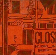 An orange-tinted image of an urban environment. In the background is a building with a fire escape, and below it, a sign with writing partially obscured by a lorry. The right half of the sign reads "CLOTHING". At the bottom right is a sign that reads, "CLOS— BUS. HOURS __ AM— EMERGENCY CALL—". In the top-left corner is faint writing that says, in two lines, "zero 7" and "destiny". Below it, in smaller font, is "featuring sia & sophie".