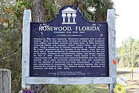 A color photograph of the back of the bronze plaque in Rosewood