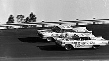 Lee Petty No. 42 and Johnny Beauchamp No. 73 battle on the last lap of the 1959 Daytona 500.