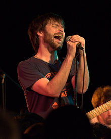 Morrison performing with The Dismemberment Plan at the Black Cat in Washington, D.C. on January 21, 2011