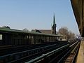 Looking south bound on the Westchester Square platform with St. Peter's church in the distance.