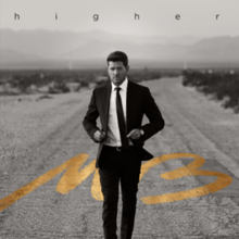 A black-and-white image of man wearing a suit while walking on a desert road. The album title is above the man, while the artist's logo is behind him on the road, colored in black and gold respectively.