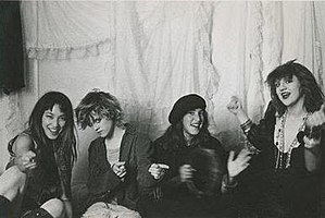 A promotional shot of the band. From left to right: Janis Tanaka, Kat Bjelland, Deirdre Schletter, and Courtney Love.