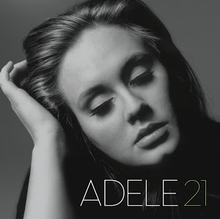 A black-and-white close-up of Adele, shown with her eyes closed and leaning her head on her hand. The singer's name and the album title are written at the bottom.