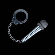 Cover art for "Cuff It": a handcuff attached to a microphone