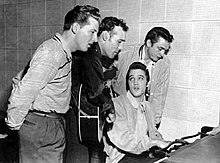Famous photograph taken during the recording session. L-R: Jerry Lee Lewis, Carl Perkins, Elvis Presley and Johnny Cash