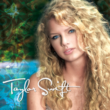 A portrait of Swift with wavy blonde hair against a blue-and-green background