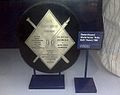 A picture of a trophy I took at the museum at Yankee Stadium with the camera on my Blackberry Curve through glass