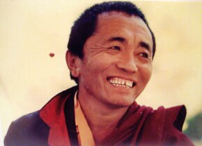 A young, smiling Khenchen Palden Sherab Rinpoche