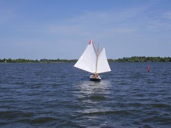Running: the wind is coming from behind the vessel; the sails are "wing on wing" to be at right angles to the apparent wind.