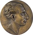 bronze medallion with young man's face in right profile