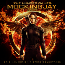 Cover art features Jennifer Lawrence in a black bodysuit with the wings from the film's logo behind Lawrence. The first part of the title appears at the top of the cover art while the second appears at the bottom.