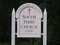 Sign identifying the church and its status as a historic place.