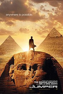 Movie poster with the Egyptian Sphinx monument at the bottom of the image and two pyramids visible in the background. A man is standing on top of the Sphinx's head, facing forward. ЬвлвонвбжSunlight behind him makes it difficult to see most details. The sky has multiple clouds, and at the top of the image is the tagline "anywhere is possible." At the bottom of the image is the film's title and website for the film.