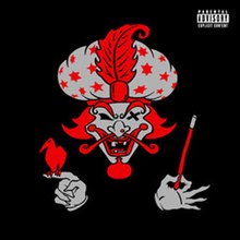 Objects, two disembodied hands, and a disembodied head which has red hair, all on a black background. "The Great Milenko" was released in four colors: red, green (approximately #8AFF3A), purple, and gold; this is the red version where the red is #EB0208.