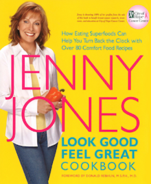 Jenny Jones standing in front of a yellow background, wearing a white button-up shirt and jeans; Jones's name and the title of the book are displayed on the center of the cover in pink and blue text, respectively