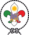 The emblem of the Boy Scouts of Iraqi Kurdistan incorporates a lamassu, an Assyrian protective deity, often depicted as having a human's head, a body of an ox or a lion, and bird's wings.[7]