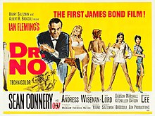 In the foreground, Bond wears a suit and is holding a gun; four female characters from the film are next to him.