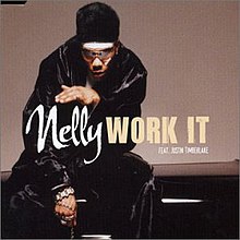 Nelly is seen sitting down in front of a beige background. The artist name and song title are positioned on the center of the cover.