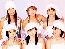 ZYX, 2003: Back row (L to R): Erika Umeda, Mari Yaguchi, Maimi Yajima. Front row (L to R): Saki Shimizu, Megumi Murakami, Momoko Tsugunaga.