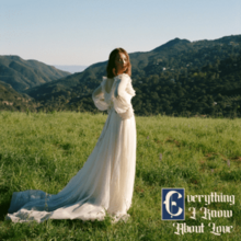 Laufey standing in a field on a mountain wearing a long white dress looking towards the viewer, with the album title in a Medieval-style font in the bottom-right corner