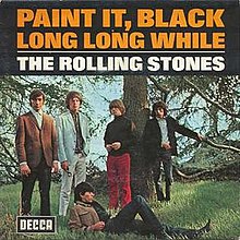 The band members are in a grassy area. The standing row has Charlie Watts, Mick Jagger, Brian Jones and Bill Wyman. Laying down in front of the others with his head resting against Mick Jagger's left leg is Keith Richards. The title of the song, "Paint It, Black", and its UK B-side, "Long Long While" are in orange text with a black background on the top of the cover. Below a white horizontal line (still with the black background) is the band name, "The Rolling Stones", in white text.