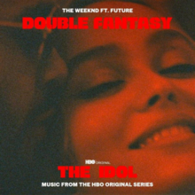 Cover art for "Double Fantasy": a photo of Jocelyn and Tedros, the Weeknd's character in The Idol, in a red filter