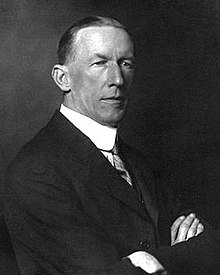 black and white photo of man in suit and tie