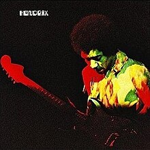 A photo of Jimi Hendrix playing guitar