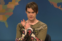 The character Stefon, portrayed by Bill Hader, with brown side-swept hair and a tattoo patterned Ed Hardy shirt, on Weekend Update