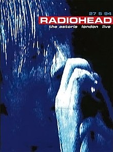 A blue-tinted image of Thom Yorke singing. On the upper right is the Radiohead logo along with "the astoria london live" and the performance date.