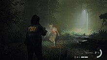 A screenshot of Alan Wake 2, showing the player's character, Saga Anderson aiming her flashlight and handgun at an enemy, in an exterior environment