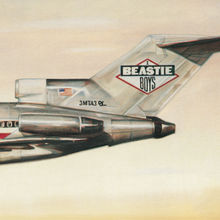 A painting of the rear end of a Boeing 727, in an American Airlines livery. The "Beastie Boys" logo is printed on its tail.