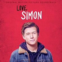 A photo of a young man, with the words, "Love, Simon"