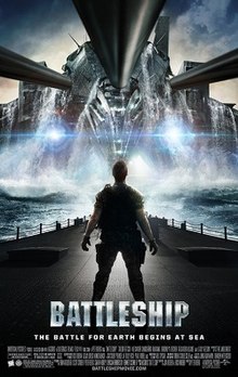 A man standing on the deck of a battleship, in front of him an alien craft rises up from the water