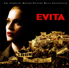 The lower part of the image shows a number of banners being carried by a crowd. The upper part of the image shows Madonna's profile in light-and-shade, dressed as Eva Perón.