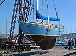 A Spaulding 33 on the derrick at the Spaulding Boatworks