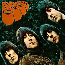 A photo of the Beatles – George, John, Ringo, and Paul. The image is diagonally warped. On the top left in a very curvy font reads the text "Rubber Soul"