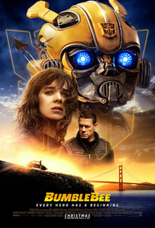 A yellow robot with glowing blue eyes, a teenaged girl, and stern-looking man are superimposed over a sunset at the San Francisco Golden Gate Bridge.