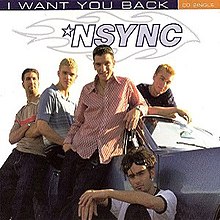 The five NSYNC members surround a blue car while in front of a white background. The title and artist name are written above them.
